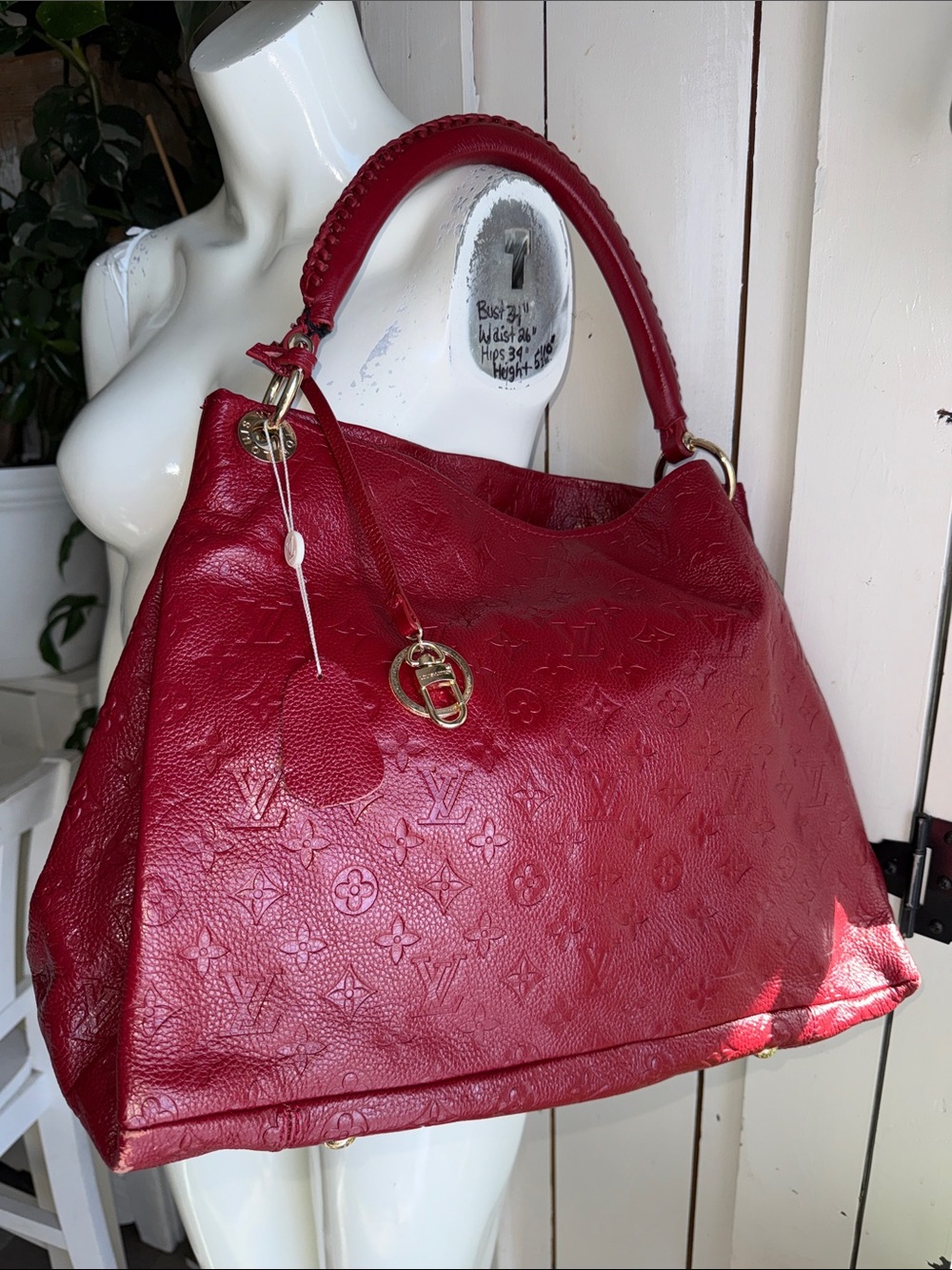 Louis Vuitton Artsy MM bag in Aurore Monogram Empreinte leather KNOCK OFF